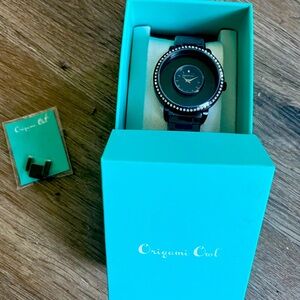 NIB Origami Black Watch with one extender.